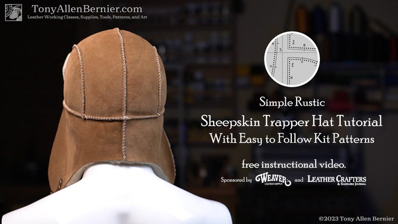 May include: A brown sheepskin trapper hat with a white fur lining. The hat is shown from the back and has a simple rustic design. The image includes the text "Simple Rustic Sheepskin Trapper Hat Tutorial With Easy to Follow Kit Patterns free instructional video. Sponsored by WEAVER and LEATHER CRAFTERS & &copy;2023 Tony Allen Bernier".