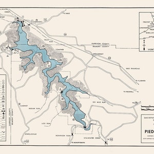May include: A black and white map of Piedmont Lake in Ohio, showing the lake's shoreline, roads, and other features. The map includes a legend and a scale. The map also includes a smaller inset map showing the location of Piedmont Lake within the state of Ohio.