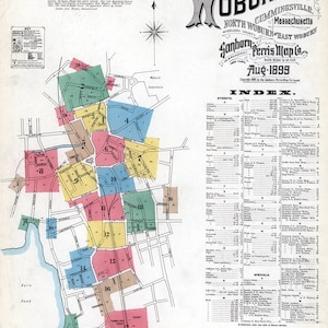 Puede incluir: Un mapa de seguros vintage de Woburn, Massachusetts, que muestra el diseño de la ciudad con distritos numerados. El mapa está fechado en agosto de 1899 e incluye un índice de calles y ubicaciones especiales.