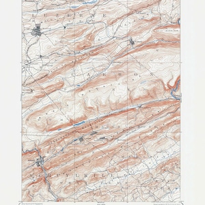 Puede incluir: Un mapa topográfico antiguo de la zona de Hazleton, Pensilvania, con curvas de nivel en tonos marrones y rojos, y azul para los cuerpos de agua. El mapa incluye nombres de lugares y texto del U.S. Geological Survey.