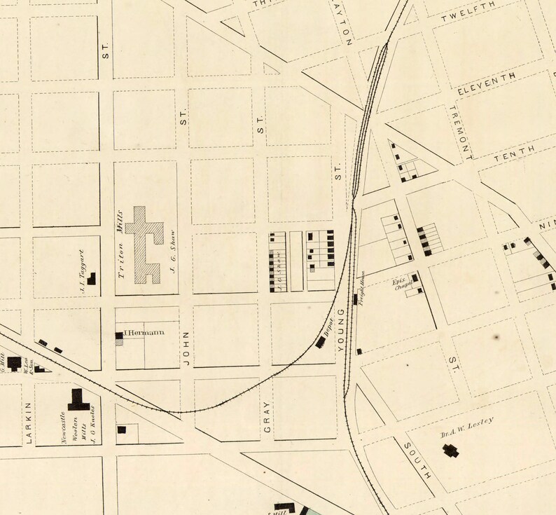May include: A vintage map of a city with street names and building locations. The map is printed on a cream-colored paper with black ink. The map shows the streets of a city with the names "Larkin", "John", "Gray", "Young", "South", "Tremont", "Twelfth", "Eleventh", "Tenth", and "Ninth".