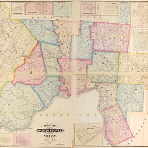 May include: A vintage map of Scioto County, Ohio, with detailed township boundaries and town names. The map is printed in shades of pink, blue, yellow, and green, with a key to the townships and towns. The map is titled "Map of Scioto County, Ohio" and is dated 1874.
