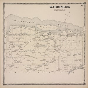 May include: A black and white map of Waddington, New York, with the St. Lawrence River and Ogden's Island labeled. The map shows roads, railroads, and other features of the area.