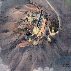May include: An aerial view of a mountainside with a series of buildings numbered 1 through 10. The buildings are mostly yellow and brown with some white accents. The buildings are located on a rocky mountainside with a path leading up to them. The text "TUCKERMAN'S RAVINE" is visible at the bottom of the image.