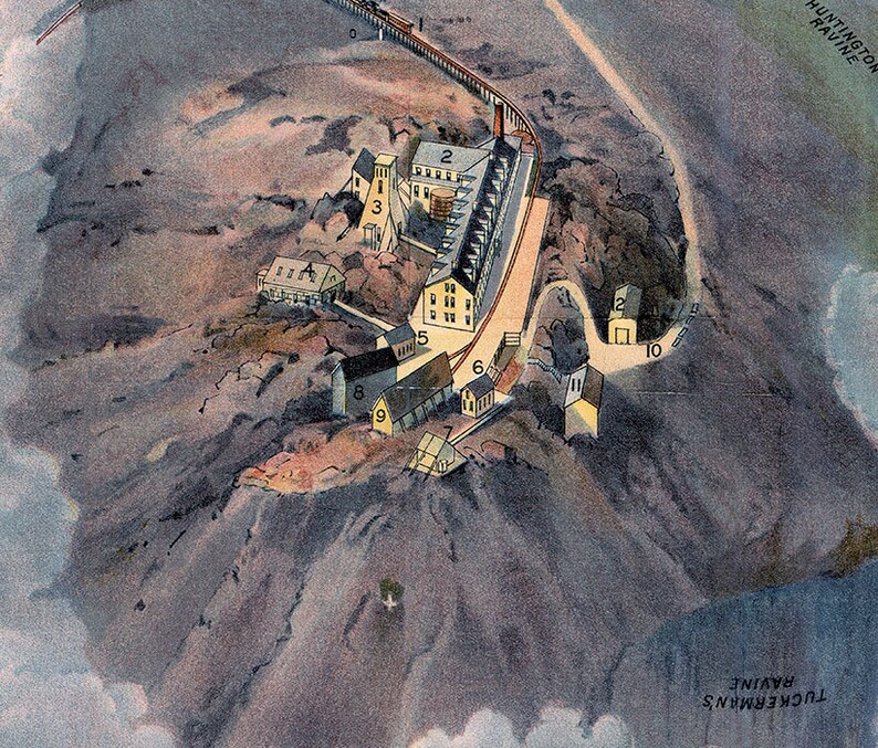 May include: An aerial view of a mountainside with a series of buildings numbered 1 through 10. The buildings are mostly yellow and brown with some white accents. The buildings are located on a rocky mountainside with a path leading up to them. The text "TUCKERMAN'S RAVINE" is visible at the bottom of the image.