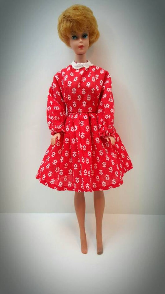 barbie doll with red dress