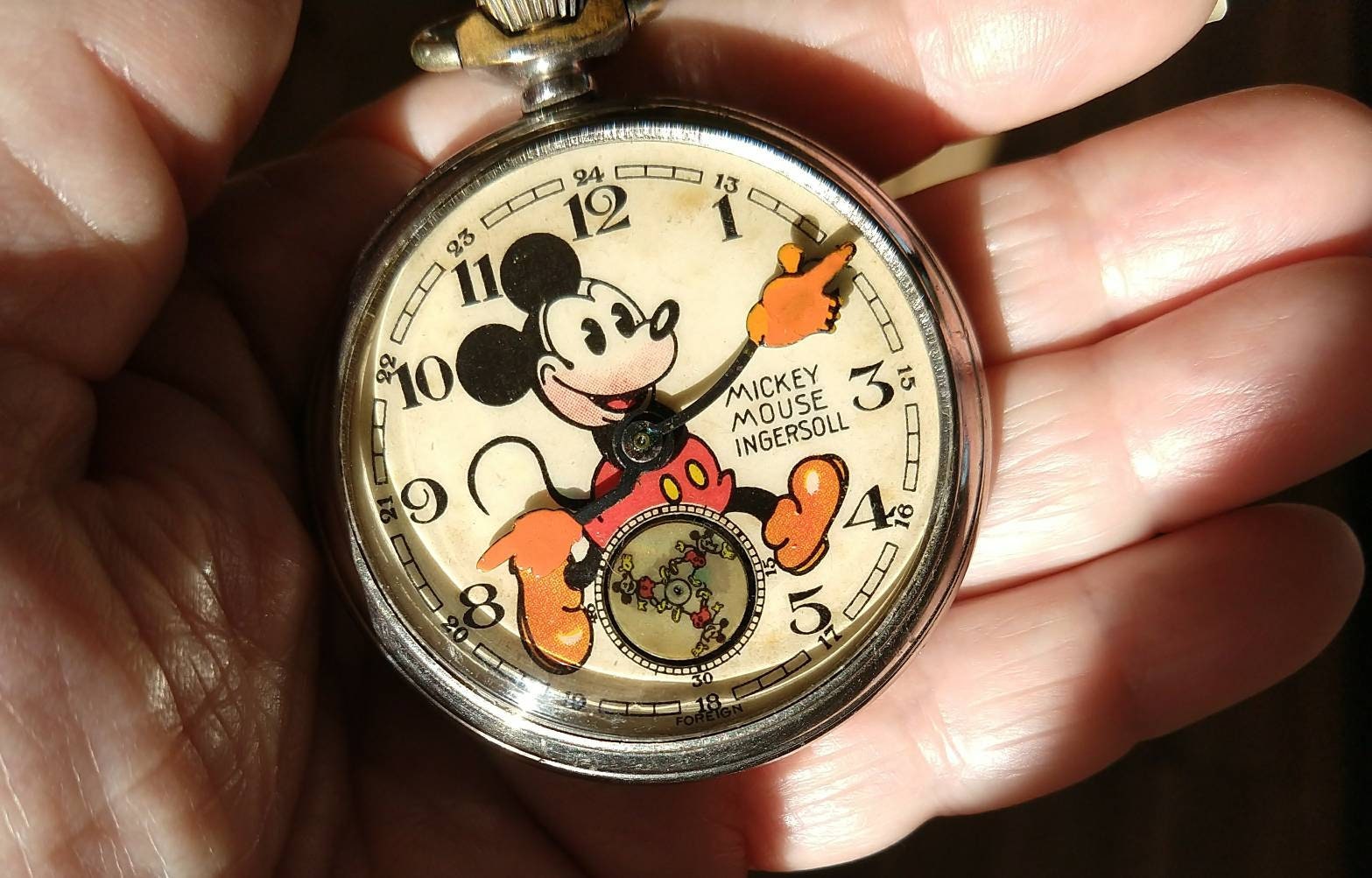Antique mickey mouse pocket watch best sale