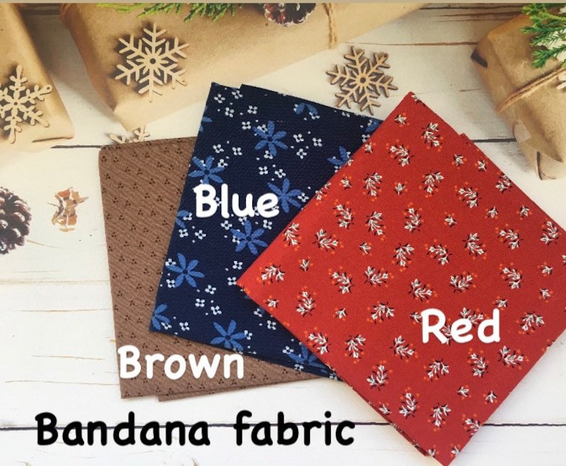 May include: Three bandana fabrics in brown, blue, and red, each with a unique pattern. The brown fabric has a dotted design, the blue features floral patterns, and the red displays a leaf pattern. The text "Bandana fabric" is at the bottom.