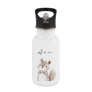 May include: White water bottle with a black lid and a cartoon squirrel illustration. The name "Ava" is written in cursive. The squirrel is brown and white with a fluffy tail. The bottle is designed for kids.
