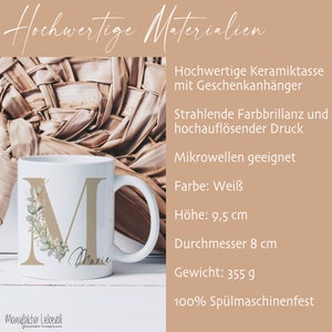 Puede incluir: Taza de cer&aacute;mica blanca con una letra M marr&oacute;n claro y la palabra "Marie" en cursiva. La taza est&aacute; decorada con un dise&ntilde;o floral verde y blanco. La taza mide 9,5 cm de alto y tiene un di&aacute;metro de 8 cm. Es apta para microondas y lavavajillas.