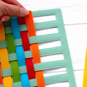 Montessori busy book page - Motor skills toy to practice weaving for toddlers and preschoolers