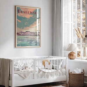 May include: A vintage-style poster with a light blue, pink, and green color scheme. The poster features a stylized image of a building with the text "Disney's Boardwalk" in a red and white font.