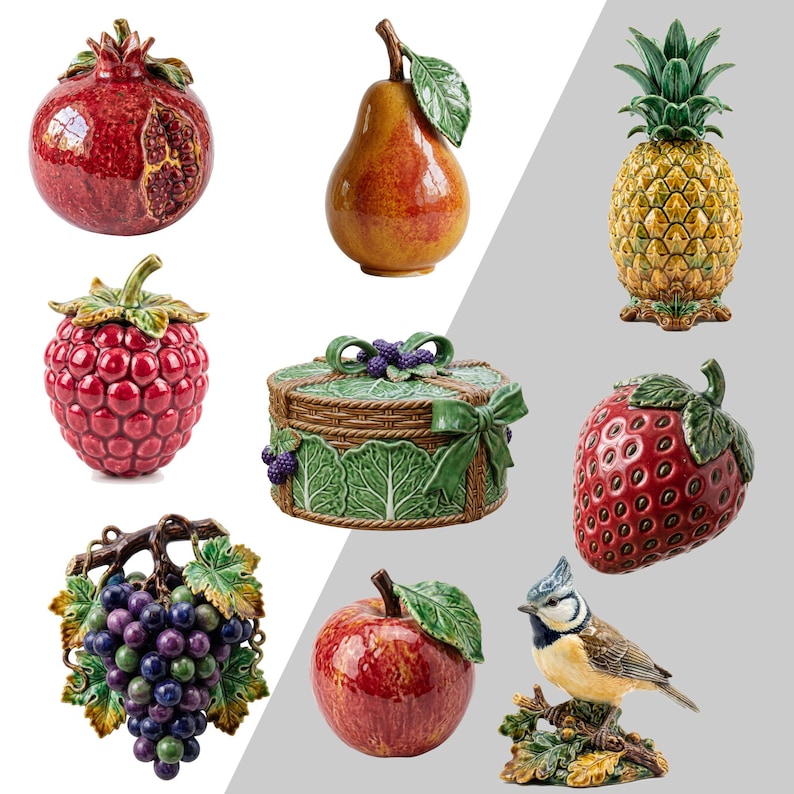 Peut inclure: Une collection d'objets d&eacute;coratifs en c&eacute;ramique comprenant une grenade rouge, une poire jaune, un ananas, une framboise rouge, un panier rond avec des feuilles et des baies vertes, une fraise, des raisins violets, une pomme rouge et un oiseau bleu et jaune.