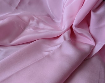 Seda rosa nueva, 45" de ancho, se vende cortada a medida