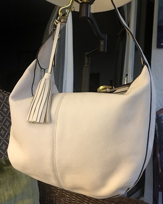 cream color coach purse