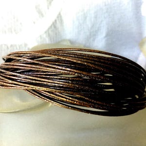 MIDCENTURY MODERN Twisted-interconnected Brass Multi-rings BANGLE