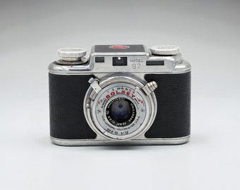 Fotocamera vintage Bolsey B2 con telemetro da 35 mm, obiettivo Wollensak da 44 mm, custodia in pelle e manuale