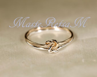 Two tone double knot       gold + Sterling ,