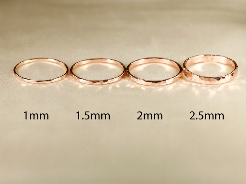 May include: Four hammered gold rings in different sizes: 1mm, 1.5mm, 2mm, and 2.5mm.