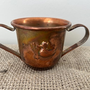 Vintage Small Copper Baby-Style Mug with Duck Relief – Dual Handles, Aged Patina