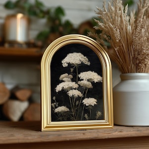 May include: A rustic wooden sign with the text "Welcome to our home" in white lettering. The sign features a distressed finish and a simple, inviting design, perfect for a front porch or entryway.