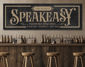 May include: A rectangular black wall sign with a tan border and decorative text that reads THE KUHN'S SPEAKEASY, PASSWORD REQUIRED, PALM BAY, FLORIDA, EST 2024. The sign features a textured background and stylized serif lettering.