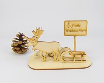 Weihnachtsgeschenk Geldgeschenk Rentier mit 3 D Schlitten Schild aus Holz Eigene Gravur Ortsschild