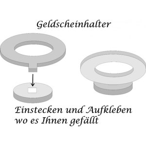 May include: A diagram showing how to use a gray plastic money holder. The holder is shaped like a ring with a small square opening in the center. The diagram shows how to insert a bill into the holder and then stick it to a surface.