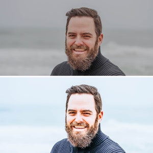 May include: A man with a beard and a dark blue turtleneck sweater smiles at the camera.