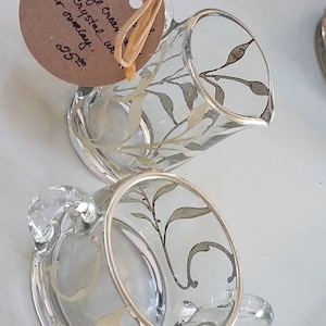 Crystal creamer and sugar with silver overlay