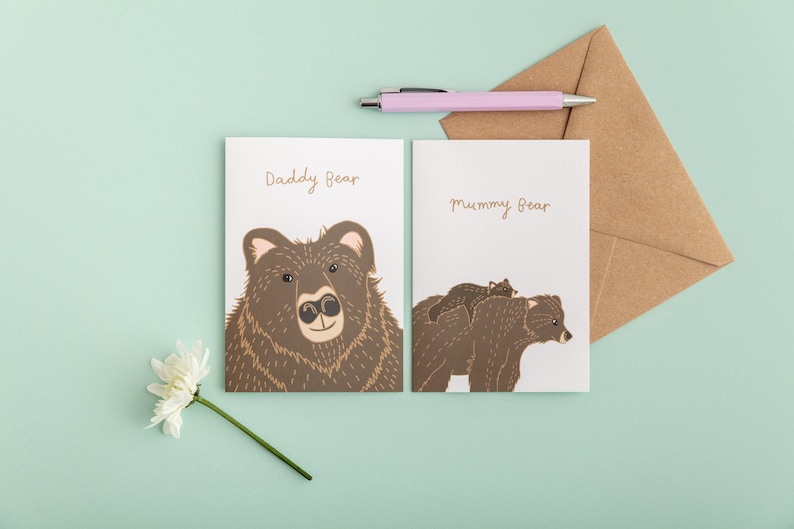 Mother's Day card illustration of mummy bear carrying baby bear on her back and Daddy bear card