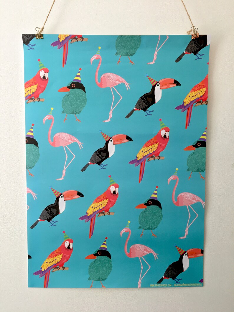 May include: A turquoise blue wrapping paper with a repeating pattern of colourful birds wearing party hats. The birds include a pink flamingo, a red and yellow parrot, a green bird, and a black and yellow toucan.