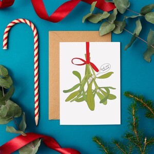 Carte de Noël de gui | pour les Fêtes drôle de Zazzle.be Liste d'envies Vous avez des idées ? Baiser de Noël maladroit | Carte de Noël humoristique de Zazzle.be Liste d'envies Vous avez des idées ? Carte de voeux de gui festif