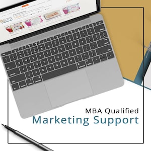 May include: A laptop computer with a gray keyboard and trackpad. The laptop is open to a website with a product listing. The text "MBA Qualified Marketing Support" is written in white on a blue background.