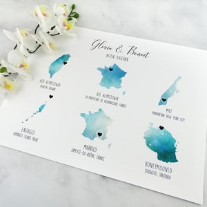 May include: A watercolor map with blue and green hues showing the locations where a couple met, got engaged, married, and honeymooned. The map includes the names of the locations, such as "Manhattan, New York City" and "Serengeti, Tanzania". The text "Gloria & Benoit Better Together" is at the top of the map.