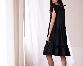 Organic cotton poplin dress AMANDINE • Black ruffled dress with bow at the back