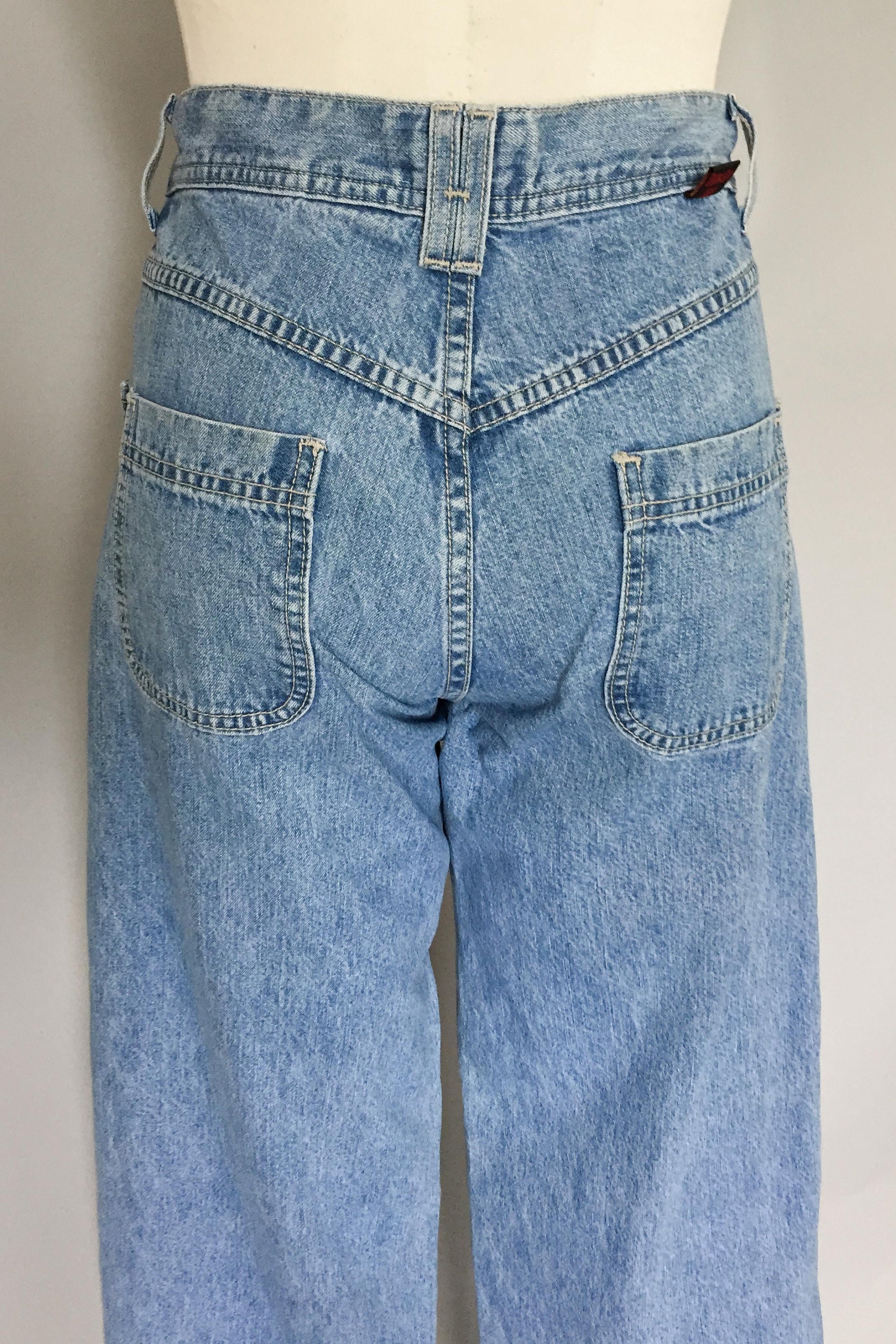 Vintage 1990s high waisted embroidered denim wide leg jeans / 90s jeans