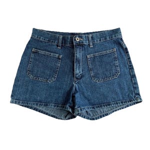 May include: A set of three ceramic mugs with a speckled, matte finish. The mugs are in shades of cream, light gray, and dark gray. Each mug has a simple, minimalist design, perfect for coffee or tea.