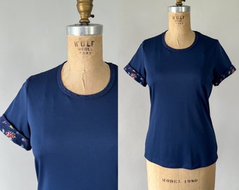 Vintage 1970s Navy Blue Polyester Scoop Neck Floral Trim Cuffed Sleeves Fitted Tee, Small S