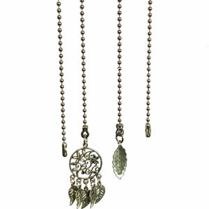 May include: Three silver ball chain pull cords with decorative ends. One end features a circular design with a floral pattern and five dangling leaves. Another end features a single leaf design. The third end is a simple loop.
