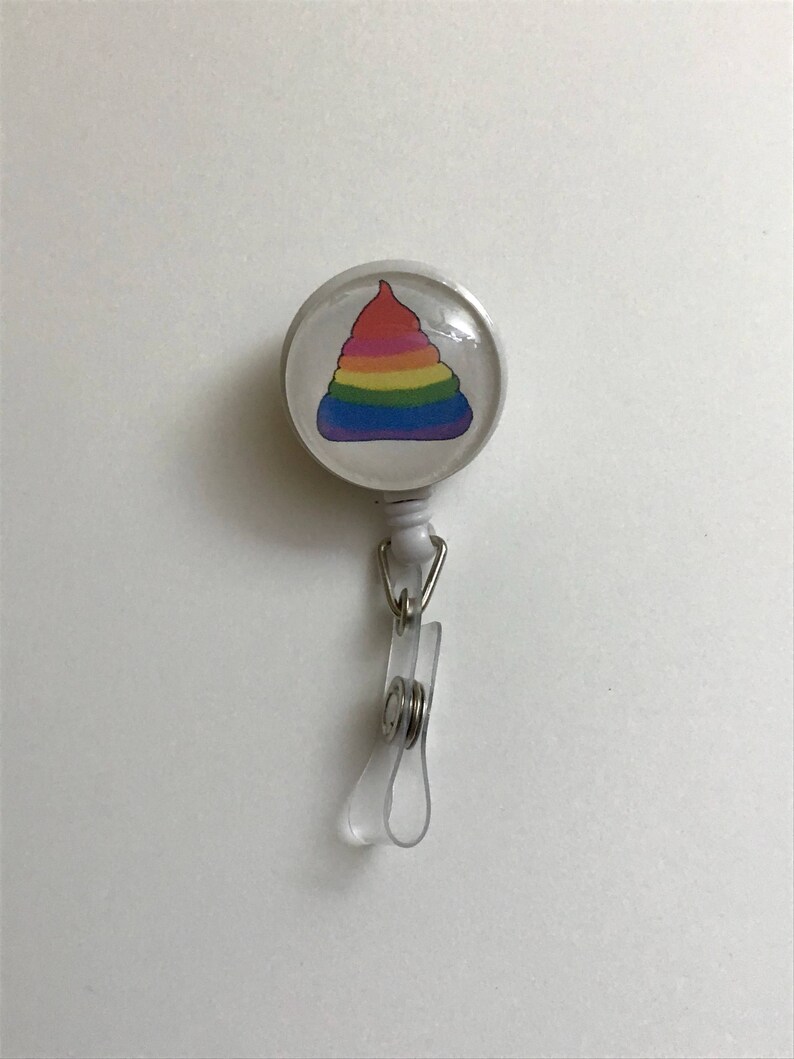 Unicorn Rainbow Poo Badge Reel Holder on alligator swivel clip