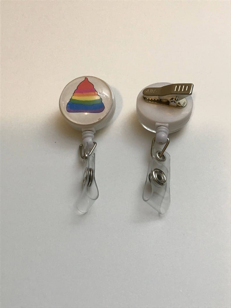 Unicorn Rainbow Poo Badge Reel Holder on alligator swivel clip