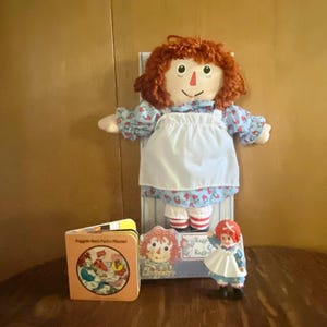 Raggedy Ann Doll- 3 Piece Vignette includes Raggedy Ann Doll, Raggedy Ann Mini Book & Hallmark Raggedy Ann Ornament Never Used