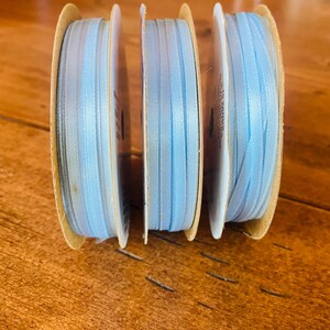 100% Vintage Hellblaues doppelseitiges Band von Shop-Shop