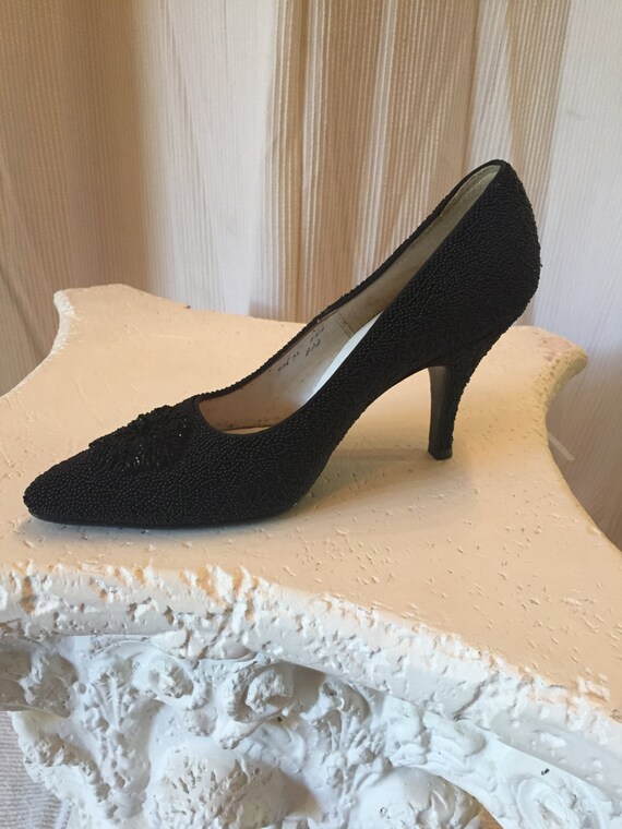 black beaded pumps