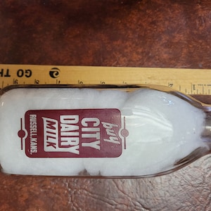 Dairy Milk Bottle &quot;buy CITY DAIRY MILK&quot;- Russell, Kans., Square Quart Liquid Bottle Back reads: &quot;Drive Slow  Let Them Grow&quot; with Boy & Girl