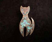 Mid century mixed metal cat brooch in sterling, brass and copper with mosaic inlay.