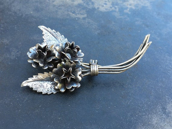 Lang sterling brooch, spray of flowers - image 1