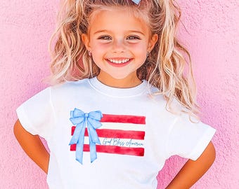God Bless America Bow Shirt • Coquette American Flag Shirt • Girls 4th of July Shirt • Patriotic Kids Tee • Red White Blue Girl Outfit