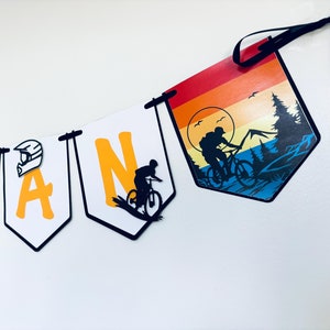MTB birthday decorations, mountain bike name banner, full face helmet, downhill mountain biking, bike tire, wheel spokes, cycling, bicycle